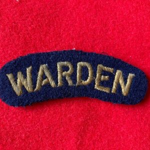 WARDEN shoulder title