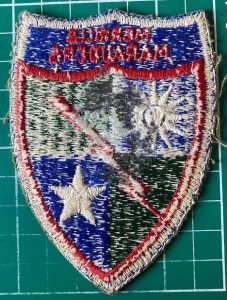 Reverse of Merrills Marauders cloth badge