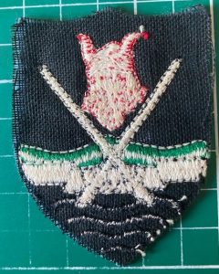 Reverse of WW2 Eastern Command Formation Sign badge