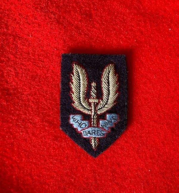 Special Air Service beret badge.
